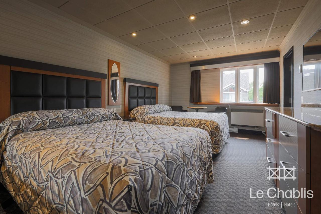 مونتريال Hotel Le Chablis Cadillac المظهر الخارجي الصورة